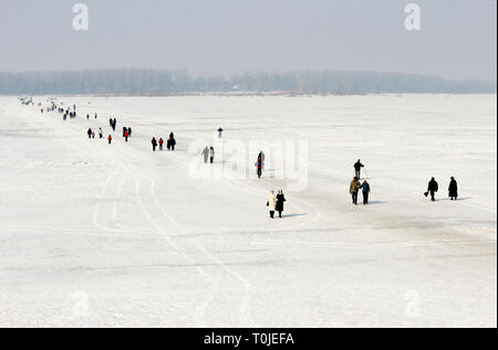 Winter ice crossing over the Volga River near the city of Samara Stock Photo