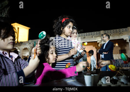 Qeshm Island, Iran. 19th Mar, 2019. Children paint on eggs in the celebrations of the fire festival in Qeshm Island, southern Iran, on March 19, 2019. The fire festival, a 4,000-year Persian tradition, is celebrated by Iranians on the eve of the last Wednesday before Nowruz (the Iranian new year). Credit: Ahmad Halabisaz/Xinhua/Alamy Live News Stock Photo