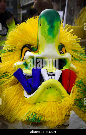 A very colourful mask of the Basel carnival in Switzerland, representing a so-called Waggis, an Alsatian peasant of the 19th century. Stock Photo