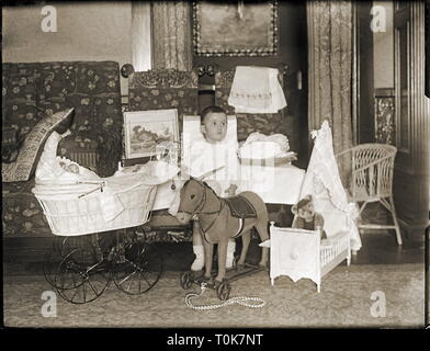 people, children, infant, two-year-old in the children's room with toys, Germany, 1907, Additional-Rights-Clearance-Info-Not-Available Stock Photo