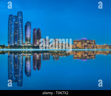 Panorama view of Abu Dhabi Skyline at sunset, UAE Stock Photo