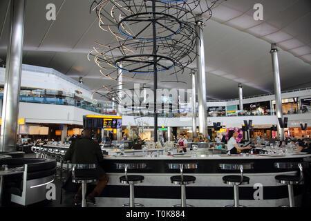 England Heathrow Airport Terminal Two Internet Cafe and Caviar House and Prunier Seafood Bar Stock Photo