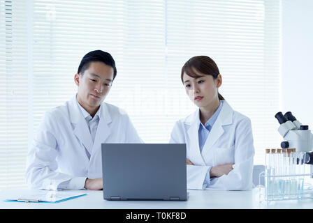 Japanese researchers in the lab Stock Photo - Alamy