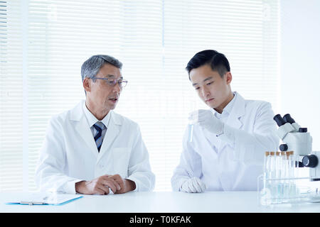 Japanese researchers in the lab Stock Photo - Alamy