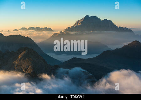 View from Rifugio Lagazuoi on sunrise, fog, Dolomites, Italy Stock Photo