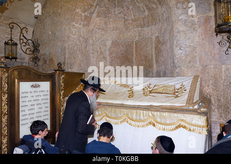 Prayers at King David’s Tomb (men's side) on Mount Zion, Old City of Jerusalem. Stock Photo