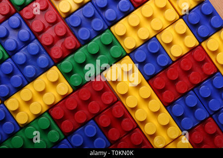 Beautiful background from a multi-colored plastic brick Stock Photo
