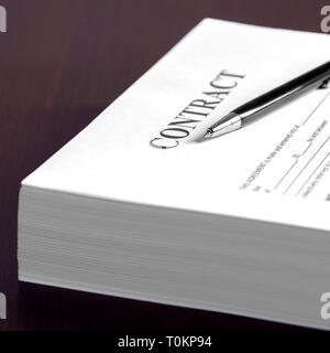 The contract on desktop, selective focus image on sign a contract Stock Photo