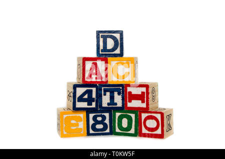 Stacked alphabet blocks on a white background Stock Photo