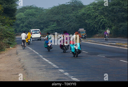 AGRA, INDIA - NOVEMBER 15, 2012: Traditional Indian family travels by car. Indian people and their colorful culture Stock Photo