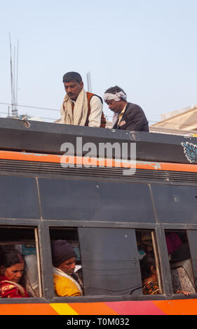 AGRA, INDIA - NOVEMBER 15, 2012: Indian people traveling by public transport Stock Photo