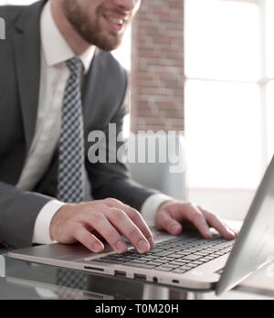 Portrait of successful businessman working in modern office Stock Photo