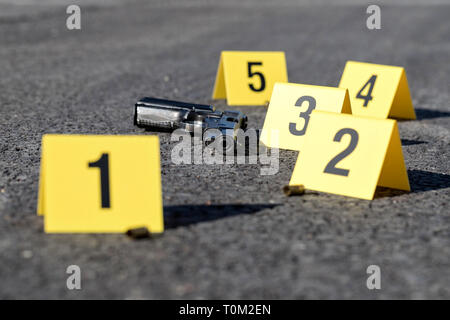 ID tents at crime scene after gunfight Stock Photo