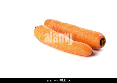 Two washed carrots isolated on white background. Copy space. Close up Stock Photo