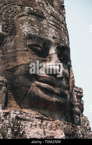 ANGKOR, CAMBOGIA - 15 MARCH 2018: The Bayon is a well-known and richly decorated Khmer temple at Angkor in Cambodia. Stock Photo