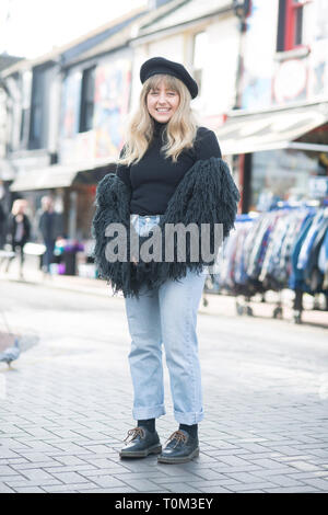 Brighton North Laine second hand vintage fashion clothing shop keepers stand in the street to have their portrait taken in a street style fashion. Stock Photo