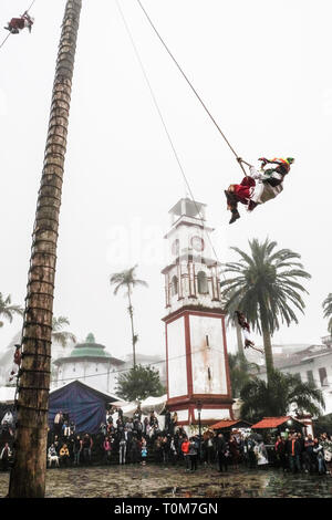 Flying Dancers in the air at Cuetzalan town center, Mexico Stock Photo