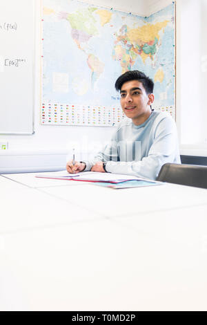 an international student studies hard in a classroom in a college in cambridge Stock Photo