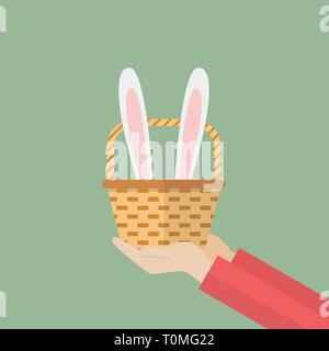 Hand holding basket with bunny ears. Easter holiday Vector illustration Stock Vector