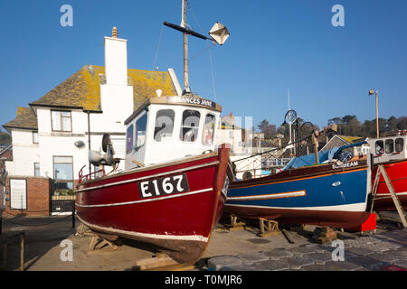 Fishing boats on Lyme Regis Beach, Dorset England UK Stock Photo