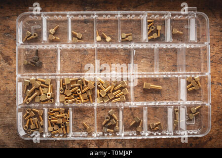 Multiple bow eyelets in a transparent box Stock Photo