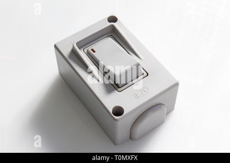 Vintage power switch on off, isolated on white background, close-up Stock Photo