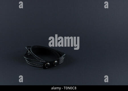 Black bracelet crystal jewelry still life isolated on black background Stock Photo