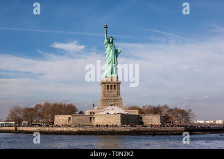 Statue of Liberty National Monument on Liberty Island, New York Harbor, New York, The United States of America. Front view, USA Stock Photo