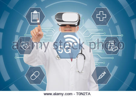 Male doctor wearing virtual reality glasses. 5G Medical Concept. Computer Graphic. Stock Photo