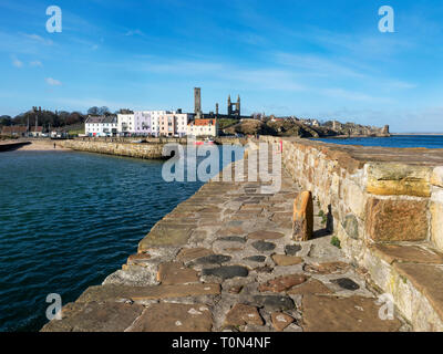 St Andrews Harbour and St Andrews Abbey on a sunny spring morning St Andrews Fife Scotland Stock Photo