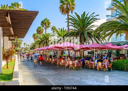 Holiday makers enjoying food and drink, Puerto De La Cruz, Tenerife Stock Photo