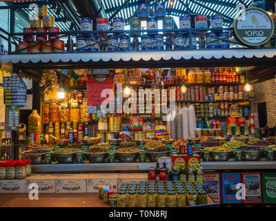 Delicatessen stall selling olives herbs and spices in Sarona Market, Tel Aviv, Israel Stock Photo