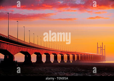 Great Britain, Wales, River Severn.  Severn Bridge at sunrise, straddling one of the largest tidal ranges in the world. Stock Photo