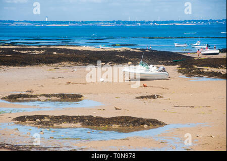 view on the beach of le petit vieil on the isle of Noirmoutier in summertime with some people on it Stock Photo