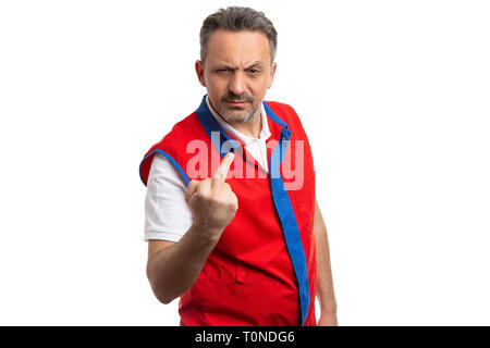 Male hypermarket or supermarket employee showing middle finger as angry gesture with expression isolated on white studio background Stock Photo