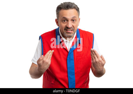 Male hypermarket or supermarket employee pointing hands at himself as innocent concept isolated on white studio background Stock Photo