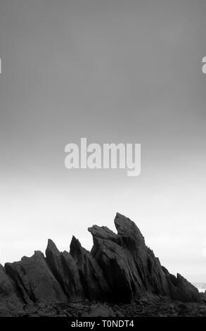 Sea stack on the beach at Duckpool, Cornwall, England, UK Stock Photo