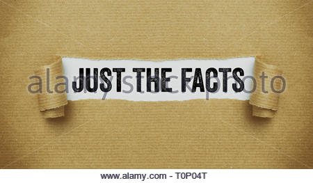 Torn brown paper revealing the words Just the facts Stock Photo