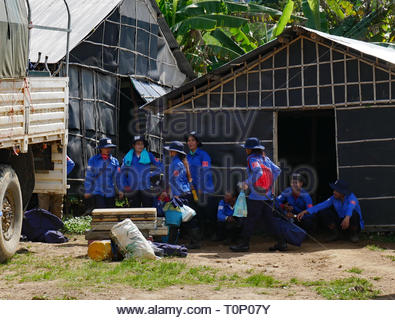 Men and women of the “HALO Trust” at base camp prepare for another mission to clear ground of landmines and UXB’s. Pailin, Cambodia. 01-12-2018 Stock Photo