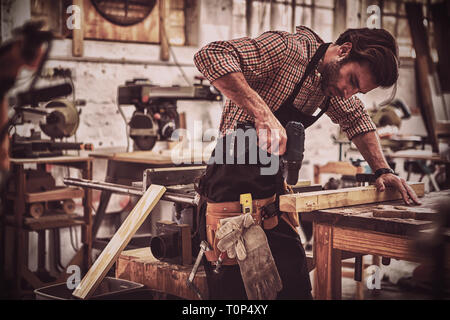 Carpenter working on his craft Stock Photo