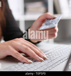 Female arm hold bunch of credit cards Stock Photo