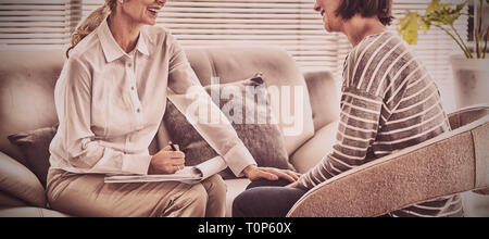 Happy therapist with patient Stock Photo