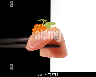 Chopsticks with Tuna Fish Fillet Stock Photo