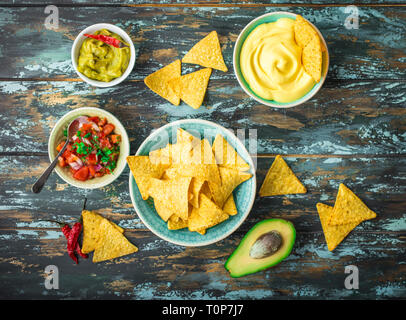 Nachos and assorted dips Stock Photo