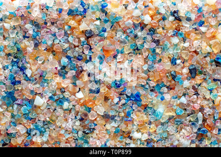 Small shiny colorful stones as a background pattern Stock Photo