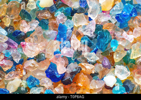 Small shiny colorful stones as a background pattern Stock Photo
