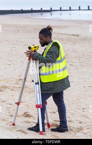 Bournemouth, Dorset, UK. 21st Mar, 2019. Lots of activity on and around the beach, as students from University of East London carry out engineering surveying field course work, as part of their studies for a mandatory field course in Land and Engineering Surveying. Credit: Carolyn Jenkins/Alamy Live News Stock Photo
