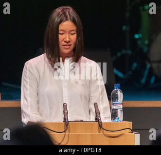 Lausanne, Switzerland. 21st March, 2019. Yiting Cao (volleyball player at LUC Volleyball) who is testifying at the 13th day of anti-racism action that occurred at the BCV Concert Hall in Lausanne, Switzerland on the 21st March, 2019. Credit: Eric Dubost/Alamy Live News Stock Photo