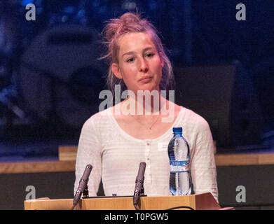 Lausanne, Switzerland. 21st March, 2019. Simone Troxler (Local athlete and medical student) who is testifying at the 13th day of anti-racism action that occurred at the BCV Concert Hall in Lausanne, Switzerland on the 21st March, 2019. Credit: Eric Dubost/Alamy Live News Stock Photo