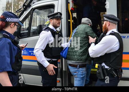 London, UK. 21st Mar, 2019. London 21st March 2019: A man is handcuffed outside Carriage Gate, Houses of Parliament. Credit: claire doherty/Alamy Live News Stock Photo